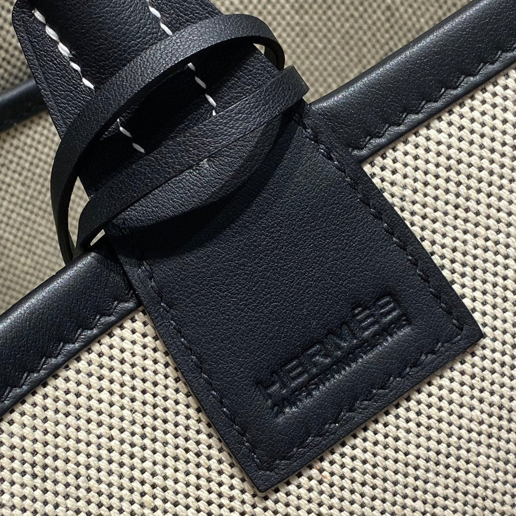 SAC HM STEEPLE 28 CUIR DE VEAU NOIR TOILE BLANCHE
