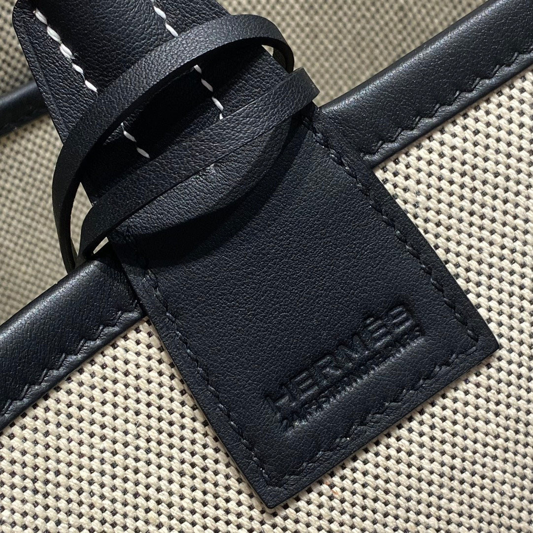 SAC HM STEEPLE 28 CUIR DE VEAU NOIR TOILE BLANCHE