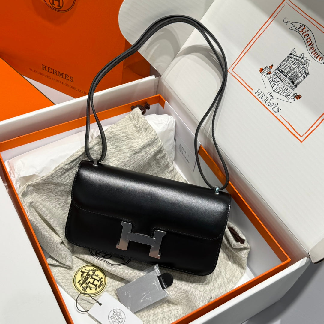 SAC HM CONSTANCE ELAN 24 CM EN CUIR DE VEAU BOX NOIR ET ACCESSOIRES ARGENTÉS