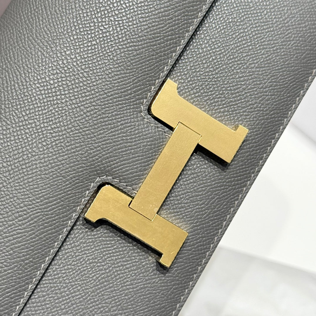 SAC HM CONSTANCE ELAN 24 CM CUIR EPSOM GRIS FONCÉ QUINCAILLERIE DORÉ