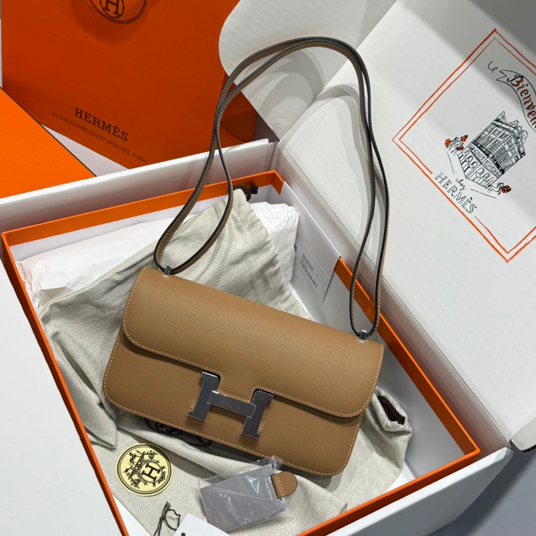 SAC HM CONSTANCE ELAN 24 CM EN CUIR EPSOM MARRON ET QUINCAILLERIE ARGENTÉE