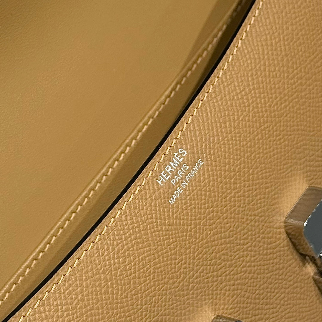 SAC HM CONSTANCE ELAN 24 CM EN CUIR EPSOM MARRON ET QUINCAILLERIE ARGENTÉE