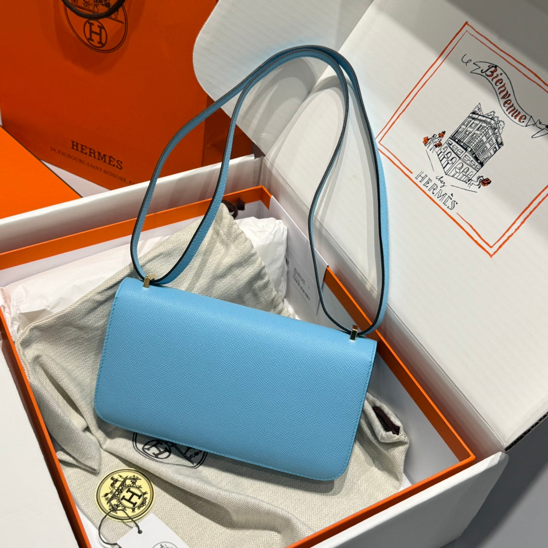 SAC HM CONSTANCE ELAN 24 CM CUIR EPSOM BLEU NUAGE ACCESSOIRES DORÉS