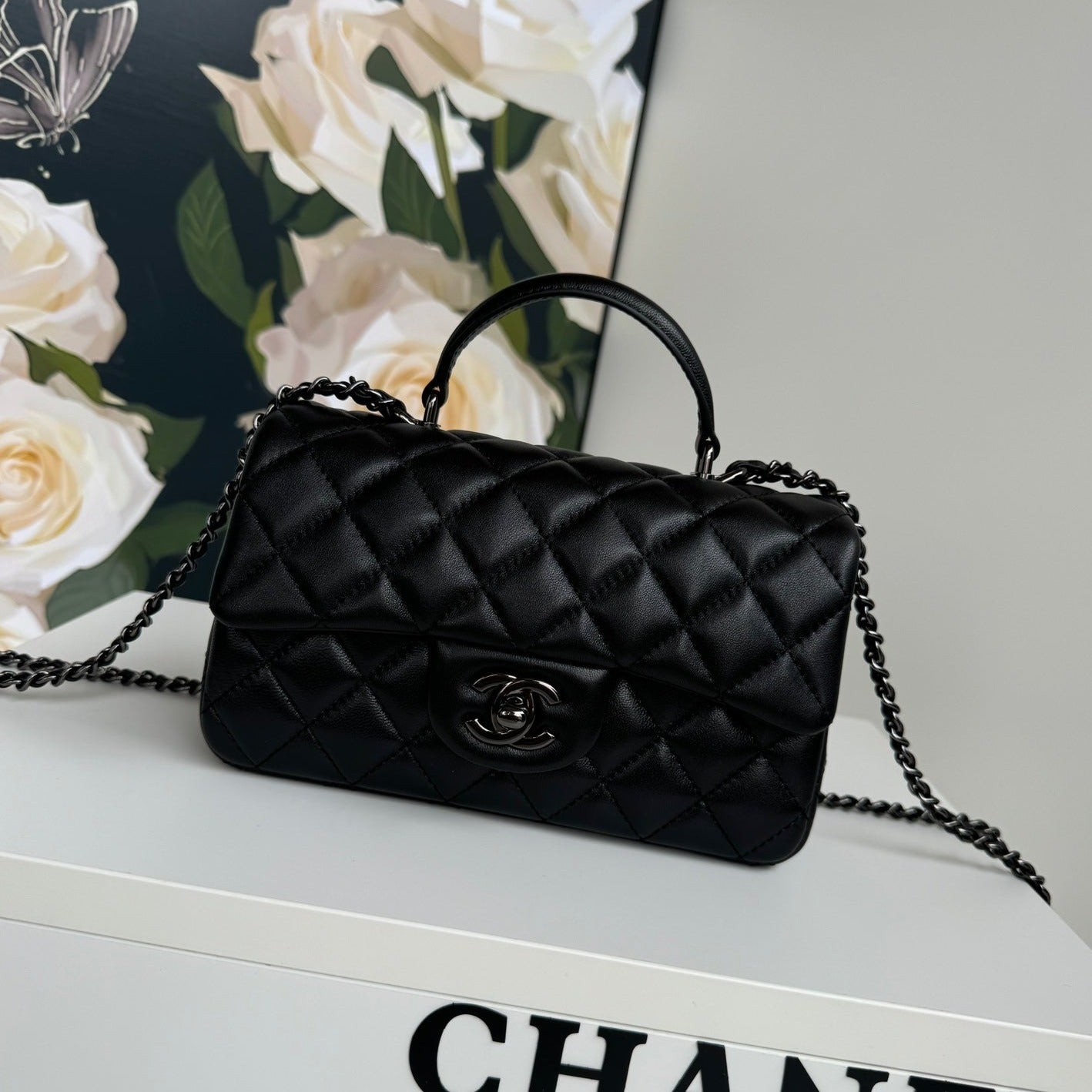 24C MINI FLAP BAG 20CM WITH TOP HANDLE ALL BLACK CALFSKIN