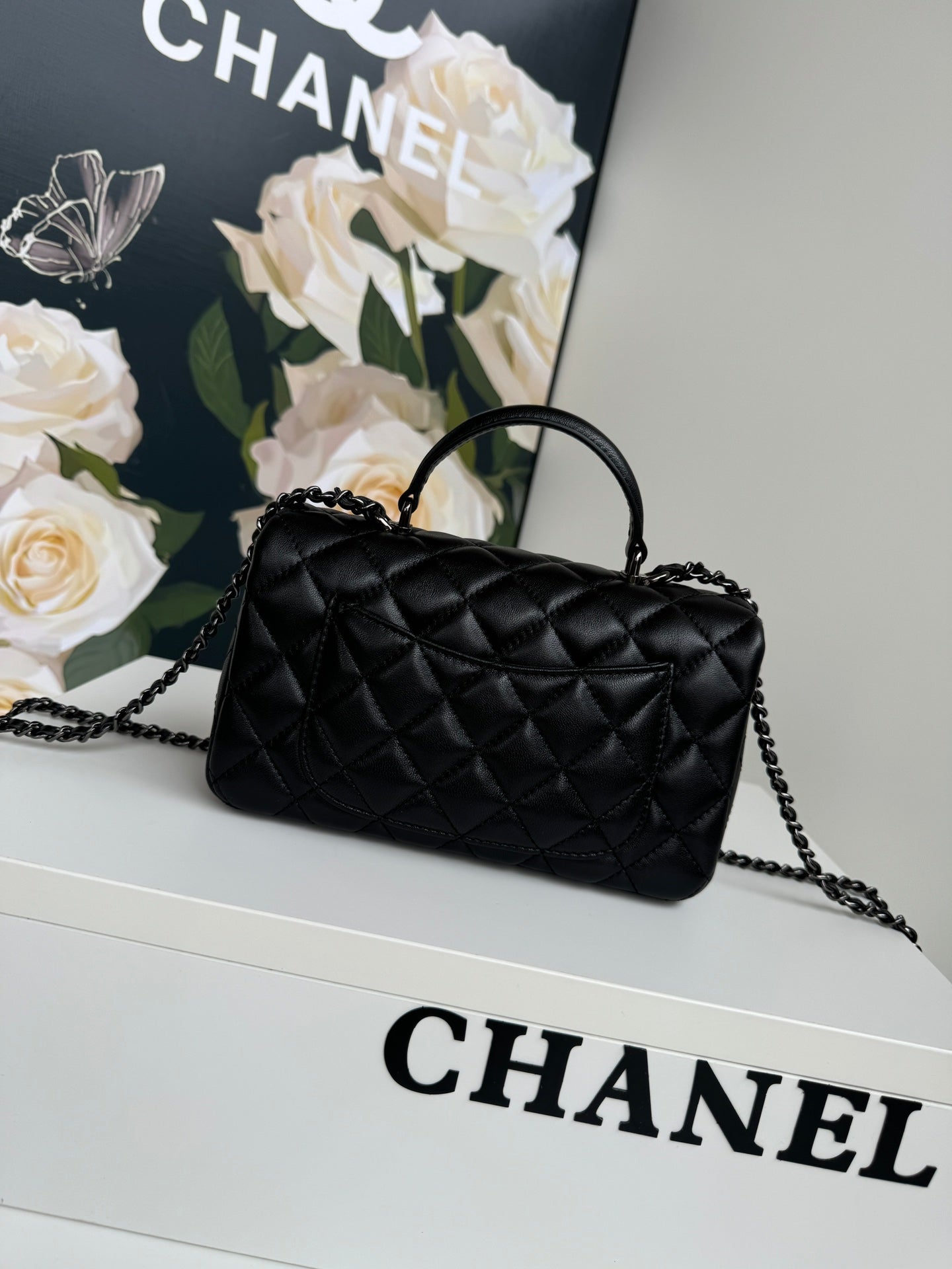 24C MINI FLAP BAG 20CM WITH TOP HANDLE ALL BLACK CALFSKIN