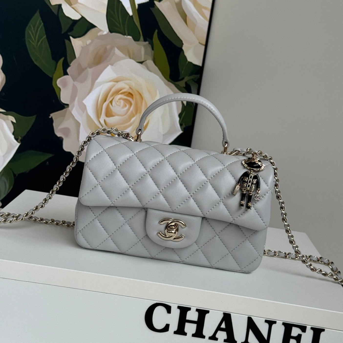 24C MINI FLAP BAG 20CM WITH TOP HANDLE GREY CALFSKIN