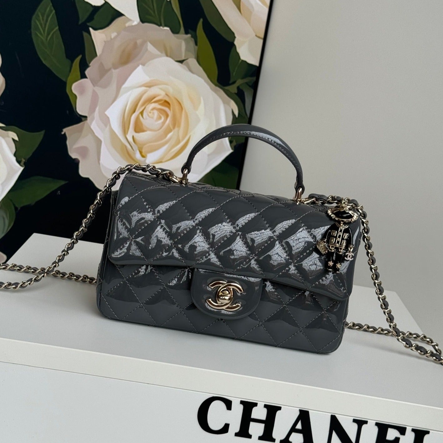 24C MINI FLAP BAG 20CM WITH TOP HANDLE GREY PATENT CALFSKIN