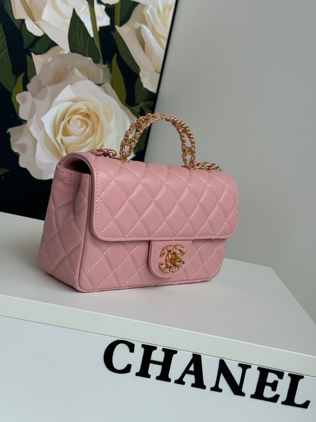 MINI SAC À RABAT 24C 20CM AVEC POIGNÉE SUPÉRIEURE EN CUIR D'AGNEAU ROSE
