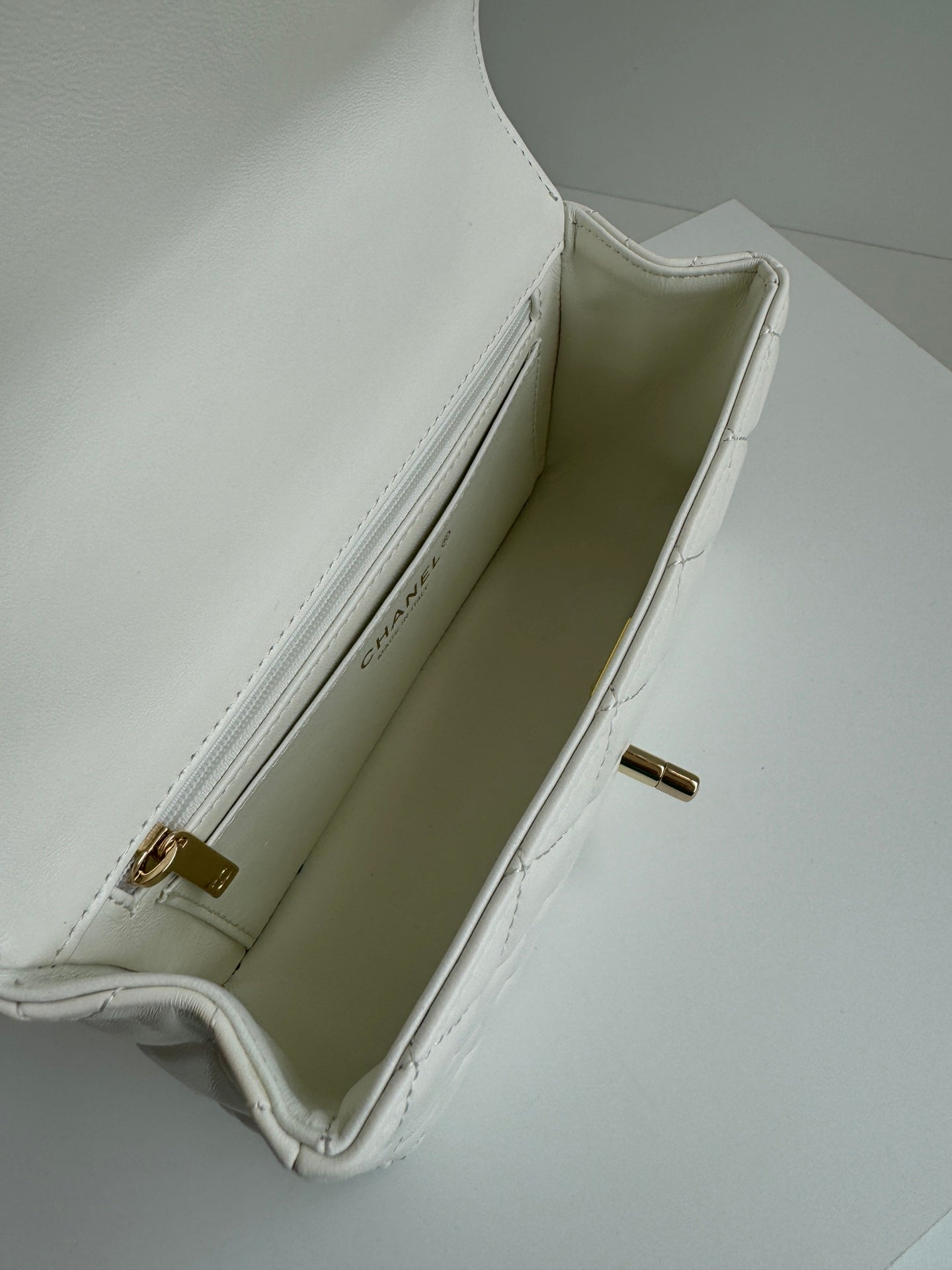 24C MINI FLAP BAG 20CM WITH TOP HANDLE WHITE LAMBSKIN