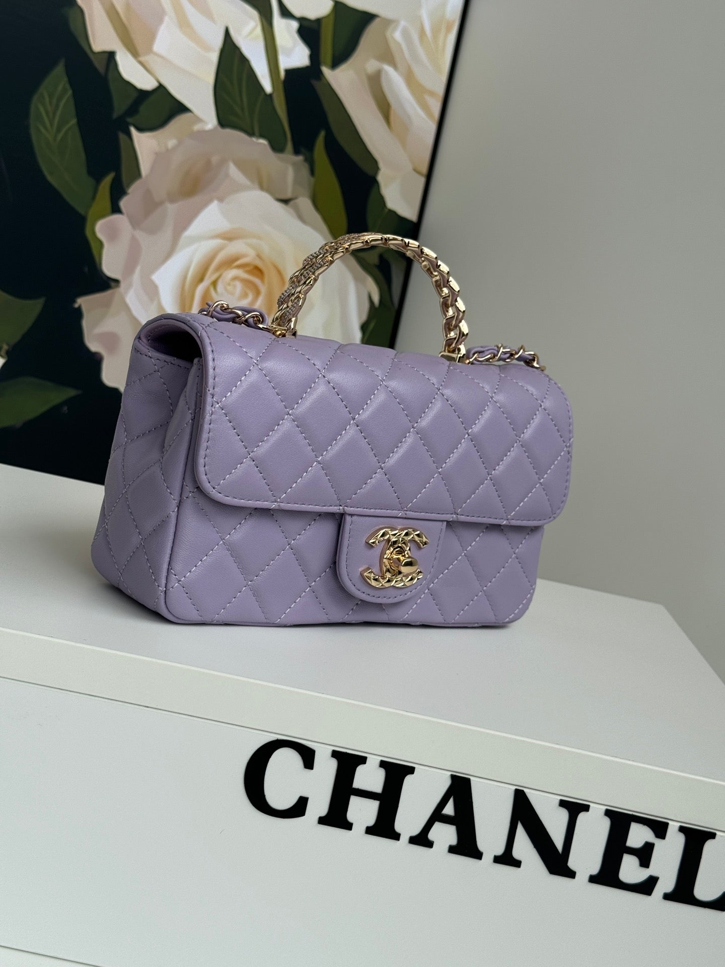 MINI SAC À RABAT 24C 20 CM AVEC POIGNÉE SUPÉRIEURE EN CUIR D'AGNEAU VIOLET
