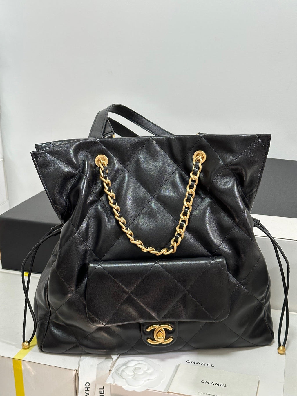 CC 25C DRAWSTRING BACKPACK BLACK LAMBSKIN GOLD HARDWARE 243655
