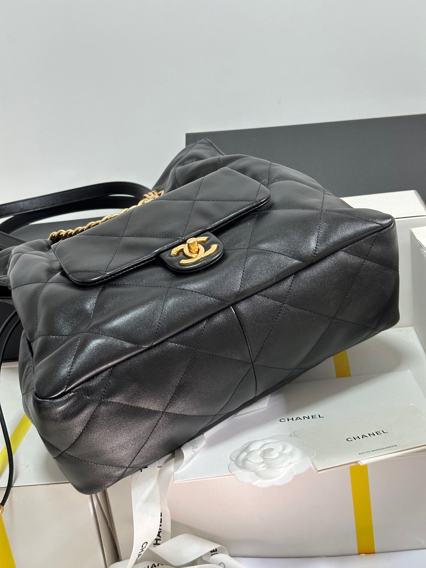 CC 25C DRAWSTRING BACKPACK BLACK LAMBSKIN GOLD HARDWARE 243655