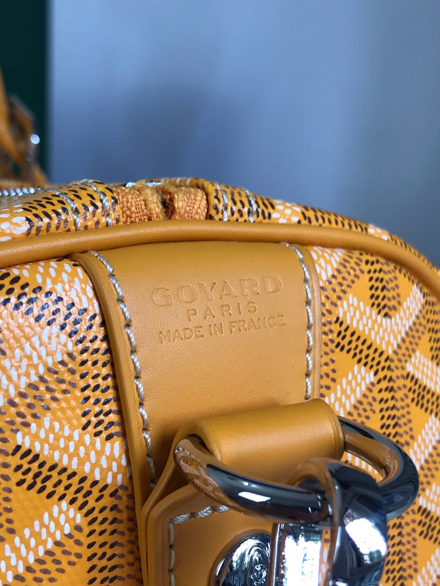 SAC BOSTON 50 EN TOILE GOYARDINE JAUNE ET GARNITURES EN CUIR DE VEAU