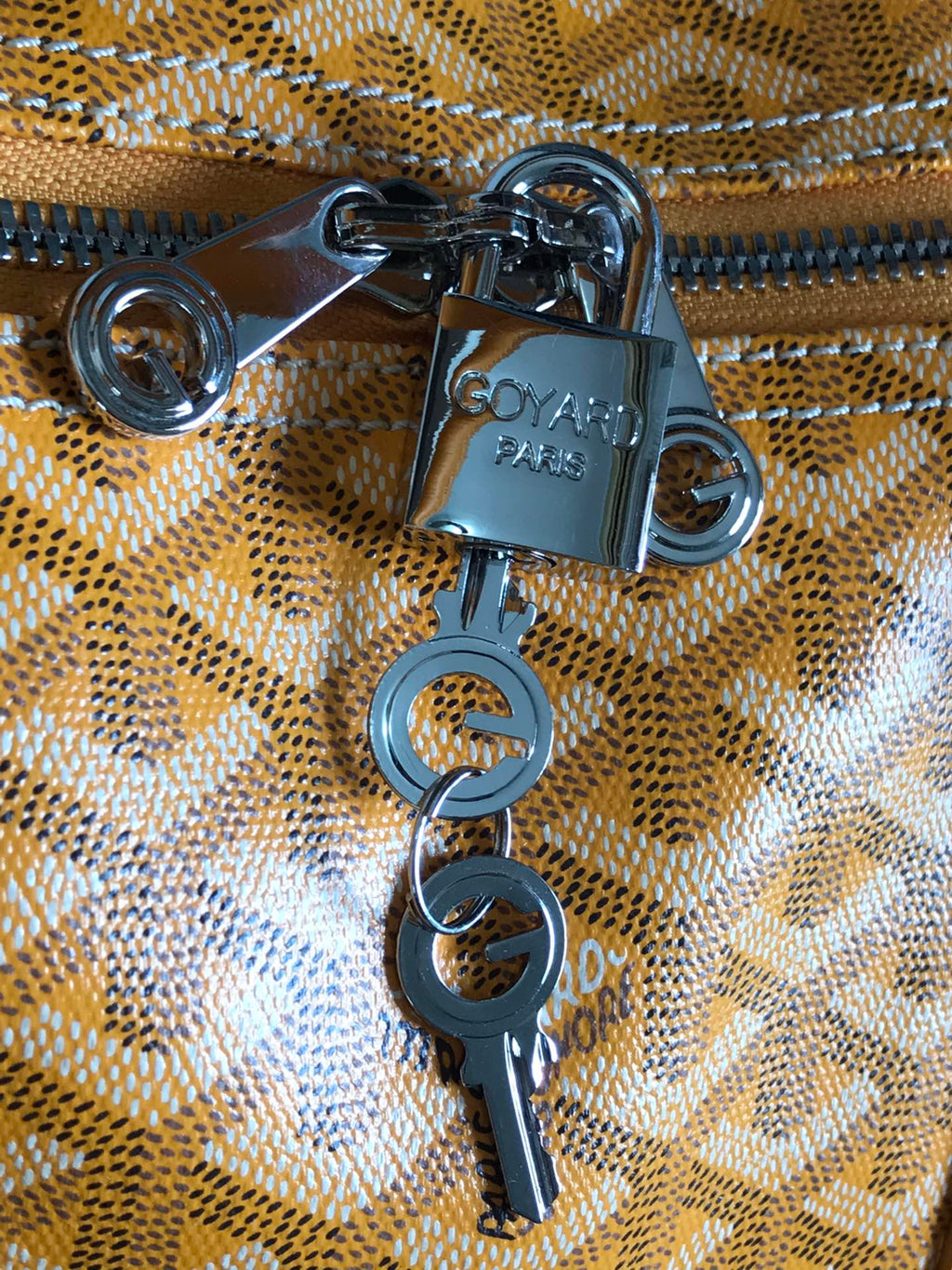 SAC BOSTON 50 EN TOILE GOYARDINE JAUNE ET GARNITURES EN CUIR DE VEAU