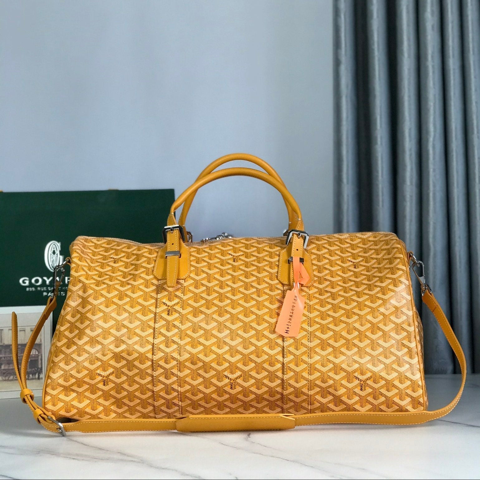 SAC BOSTON 50 EN TOILE GOYARDINE JAUNE ET GARNITURES EN CUIR DE VEAU