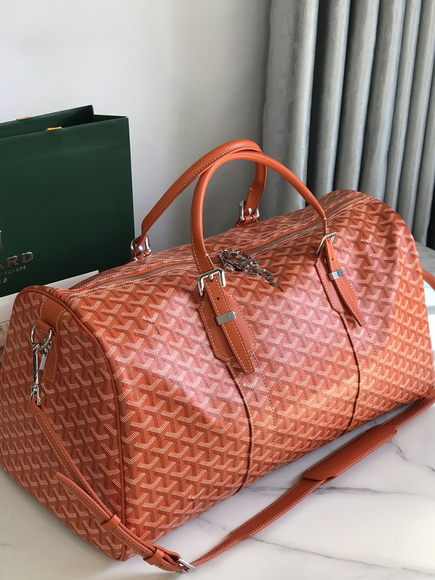 SAC BOSTON 50 EN TOILE GOYARDINE ORANGE ET GARNITURES EN CUIR DE VEAU