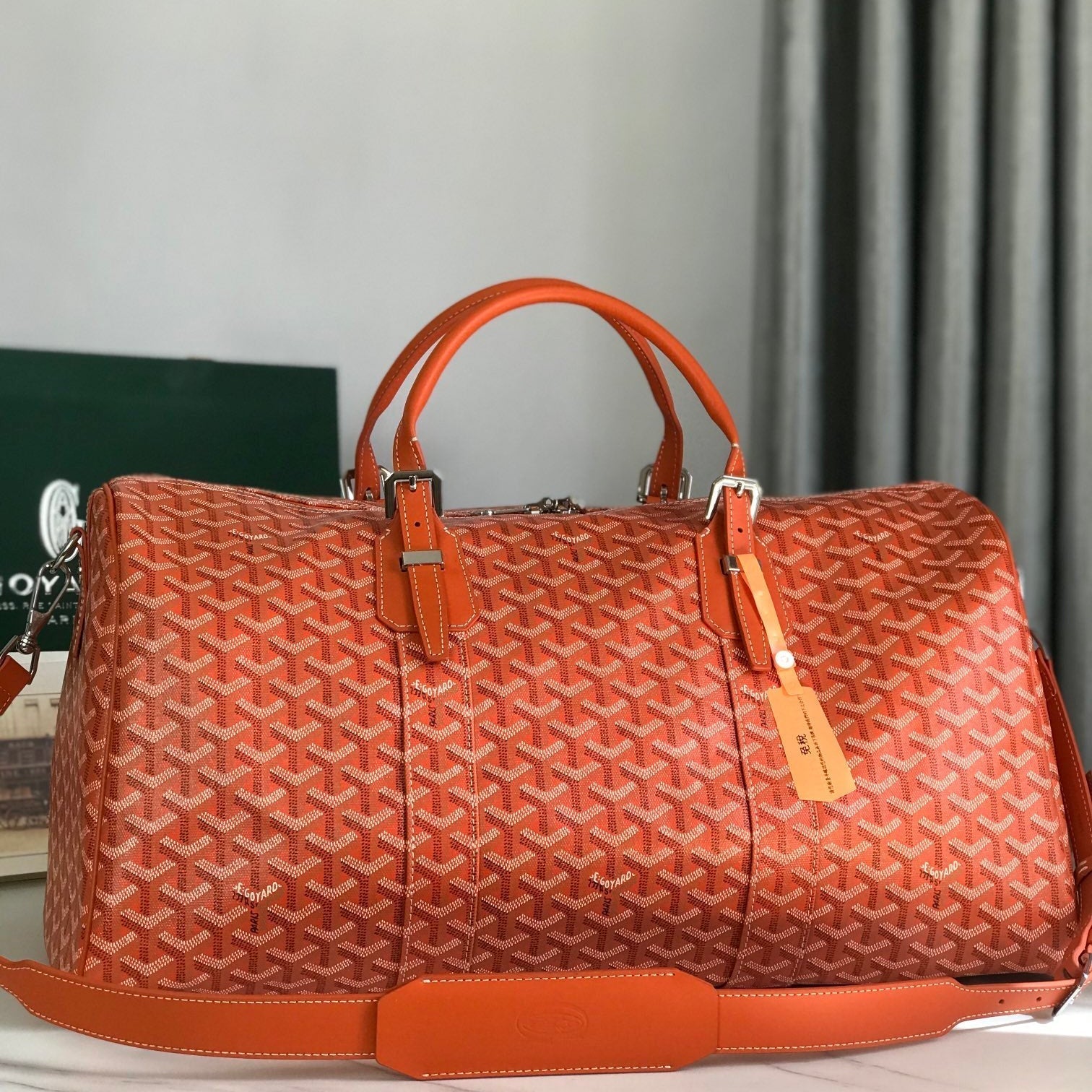 SAC BOSTON 50 EN TOILE GOYARDINE ORANGE ET GARNITURES EN CUIR DE VEAU