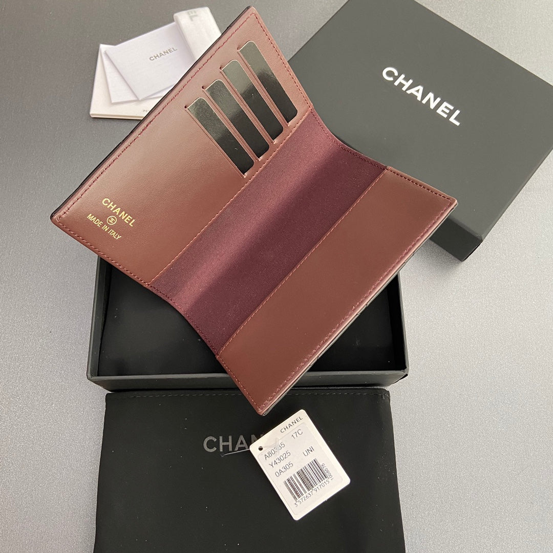 CC PASSPORT 10CM BLACK LAMBSKIN GOLD HARDWARE