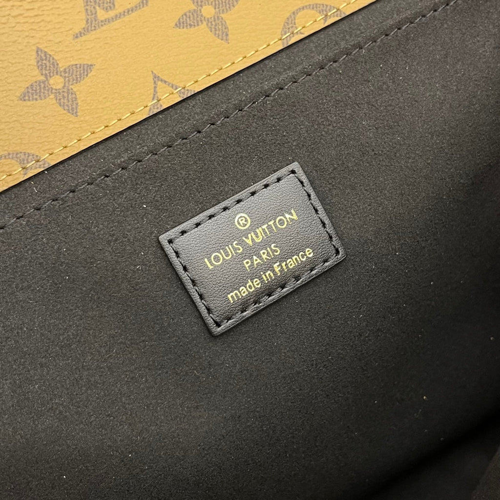 POCHETTE METIS 25 TOILE INVERSÉE MONOGRAMME