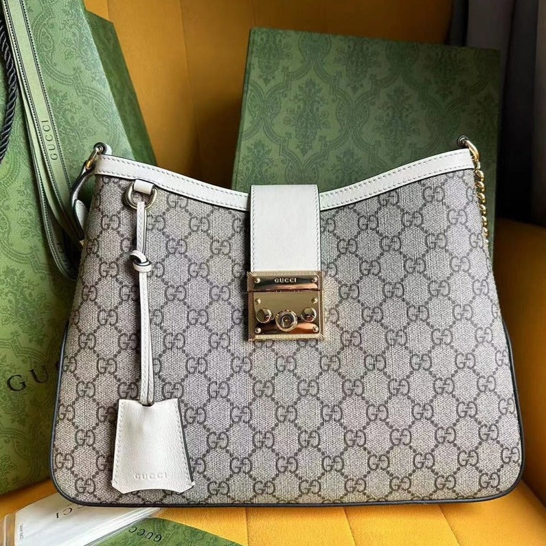 SAC À BANDOULIÈRE GG PADLOCK 32 EN TOILE BEIGE ET CUIR DE VEAU BLANC