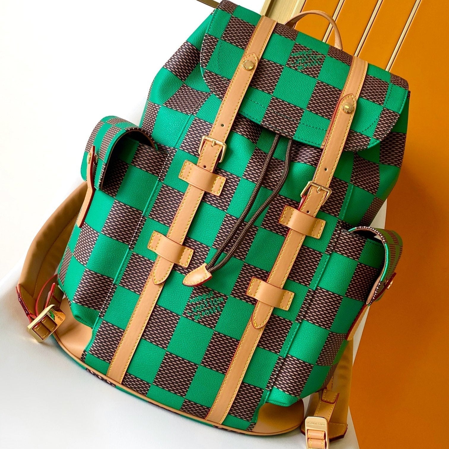 SAC À DOS CHRISTOPHER 47 EN TOILE ENDUITE DAMIER POP MARRON VERT