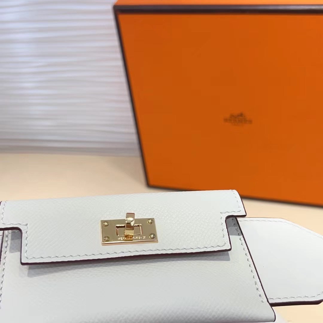Bandoulière Kelly Pocket 50 mm en EPSOM blanc et matériel doré 