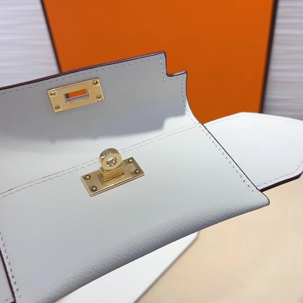 Bandoulière Kelly Pocket 50 mm en EPSOM blanc et matériel doré 
