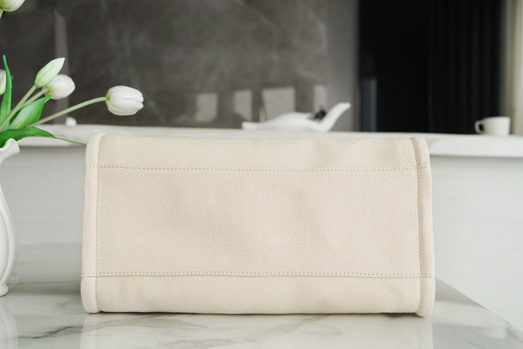 SAC CABAS 39 LOGO PERLE ATTACHÉ EN TOILE BEIGE QUINCAILLERIE DORÉ 
