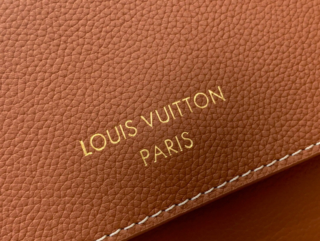 Sac messager LV Low Key en cuir de veau cognac 205007