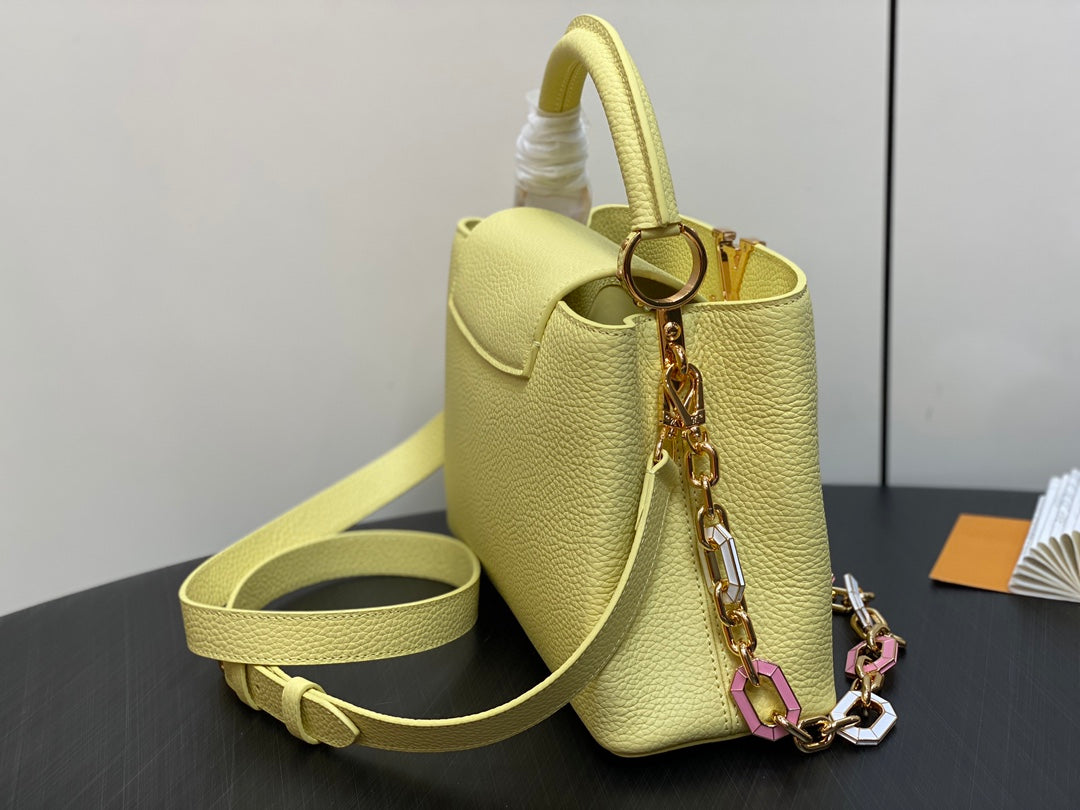 CAPUCINES MM 31.5 YELLOW TAURILLON LEATHER GOLD HARDWARE
