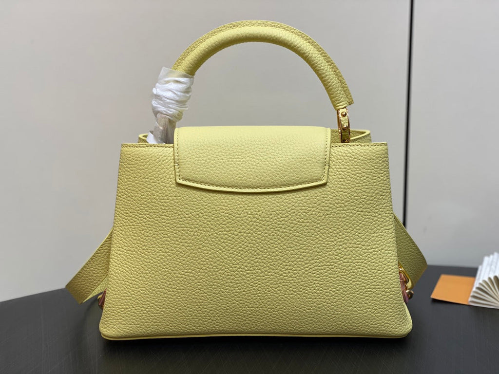 CAPUCINES MM 31.5 YELLOW TAURILLON LEATHER GOLD HARDWARE