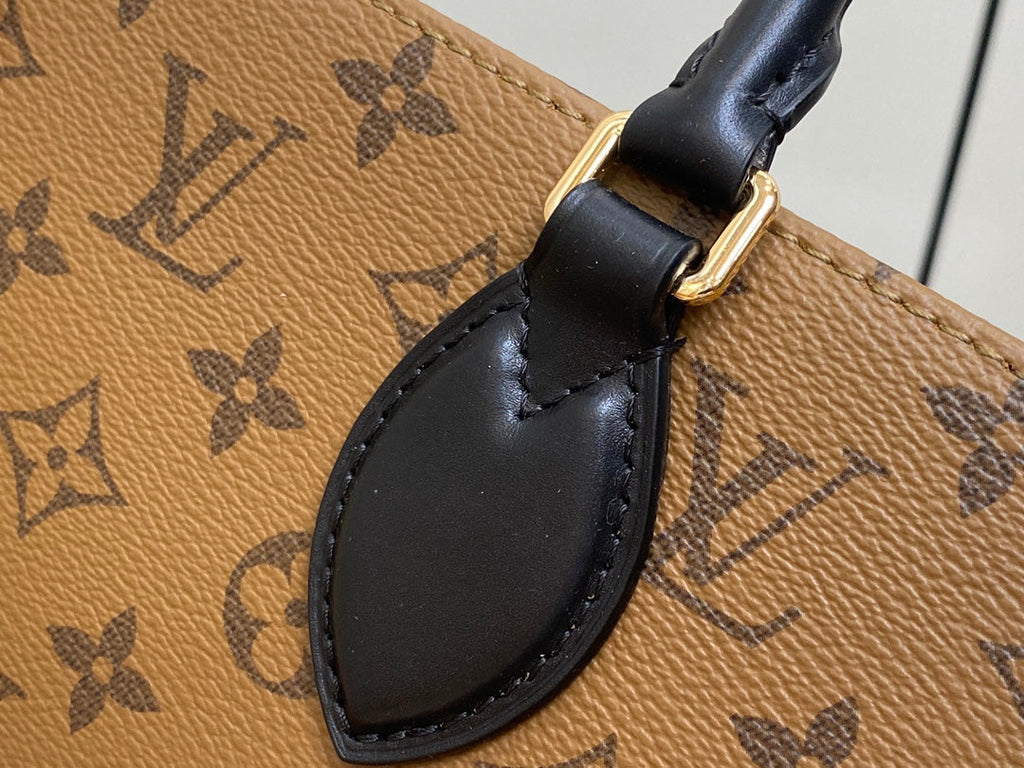 ONTHEGO PM 25CM TOILE MONOGRAMME MARRON CANARD 