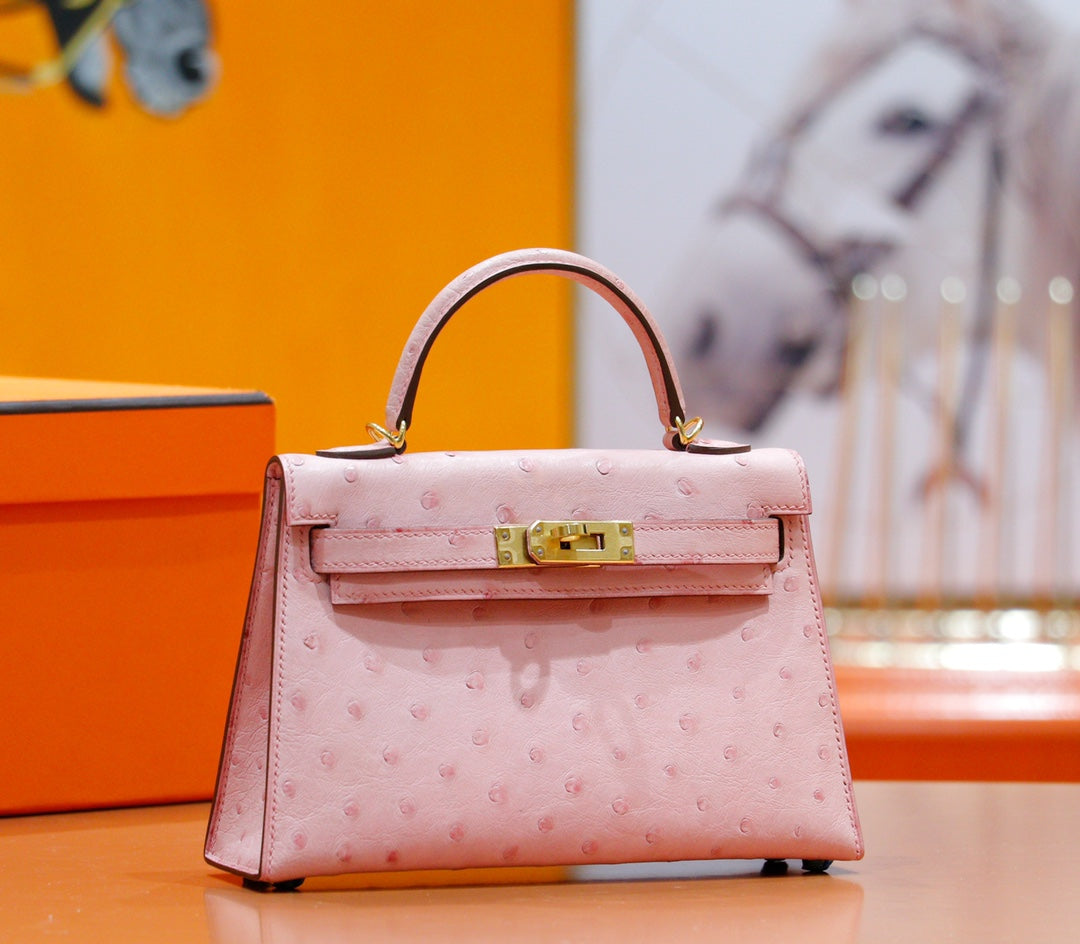 HM MINI KELLY 19CM AUTRUCHE ROSE QUINCAILLERIE DOREE