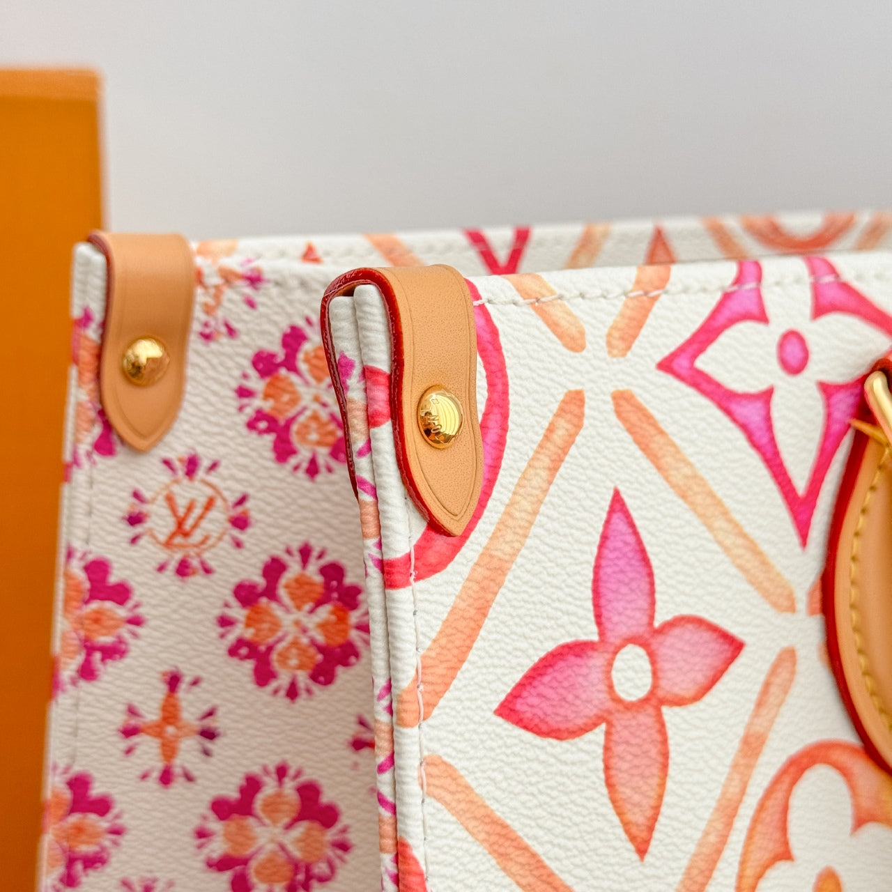ONTHEGO MM 35CM TOILE MONOGRAMME CORAIL
