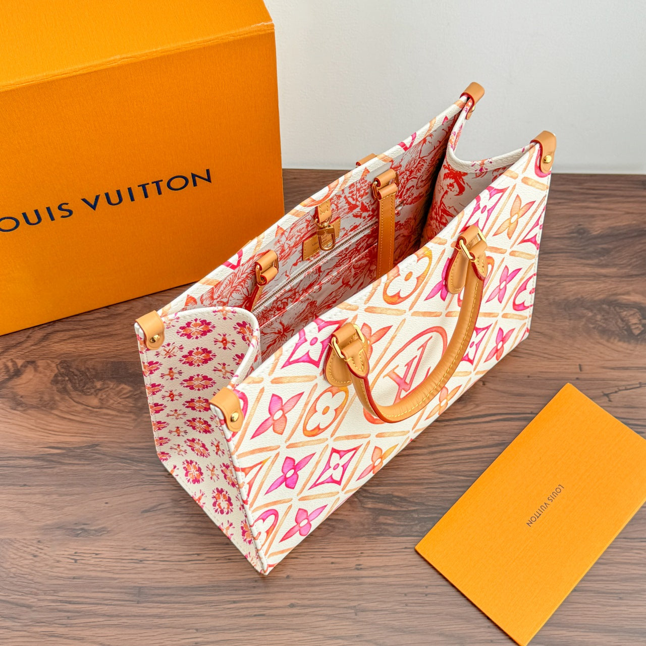 ONTHEGO MM 35CM TOILE MONOGRAMME CORAIL