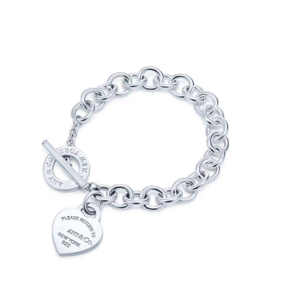 BRACELET EN ARGENT AVEC BOUCLE ARDILLON EN FORME DE CŒUR D'AMOUR RETOUR À TIF