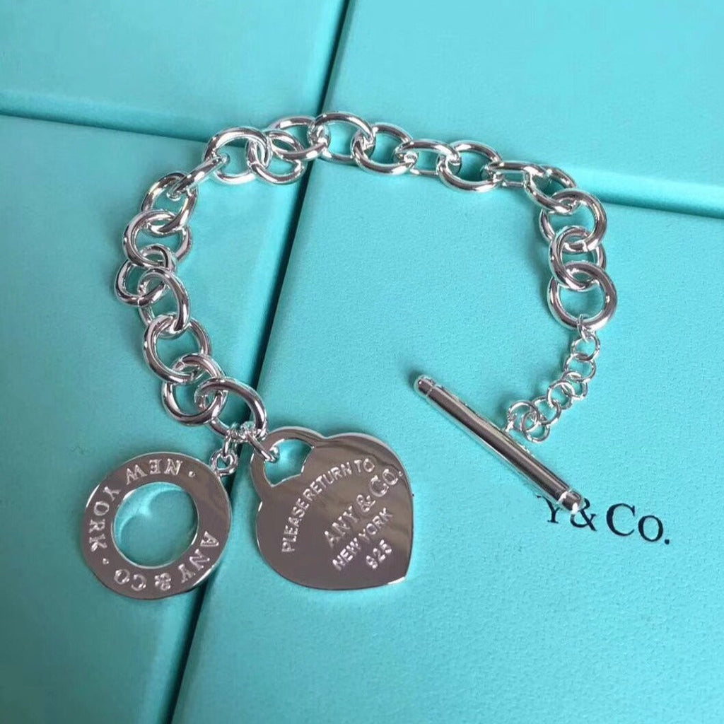 BRACELET EN ARGENT AVEC BOUCLE ARDILLON EN FORME DE CŒUR D'AMOUR RETOUR À TIF