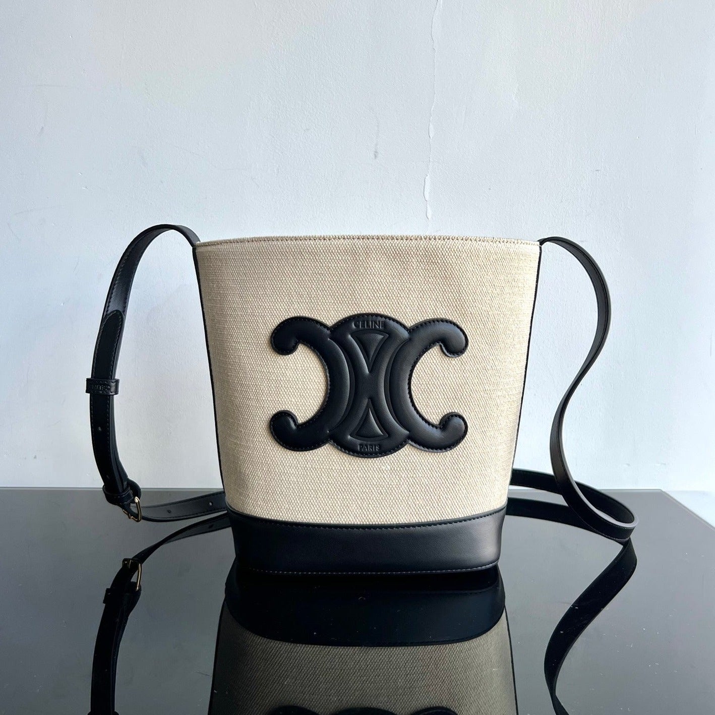 PETIT SEAU CUIR TRIOMPHE 24CM EN TEXTILE RAYÉ ET CUIR DE VEAU NOIR