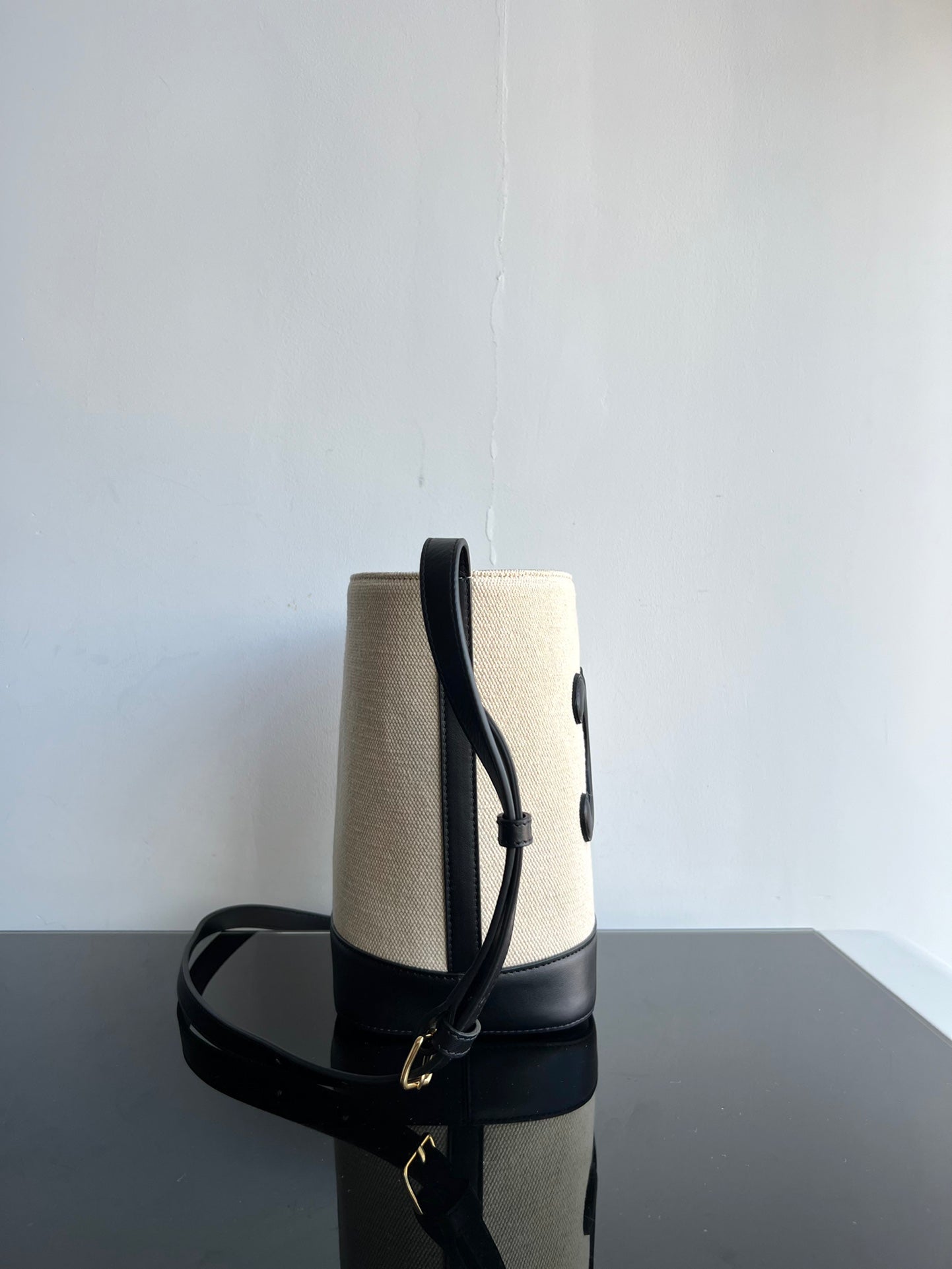 PETIT SEAU CUIR TRIOMPHE 24CM EN TEXTILE RAYÉ ET CUIR DE VEAU NOIR