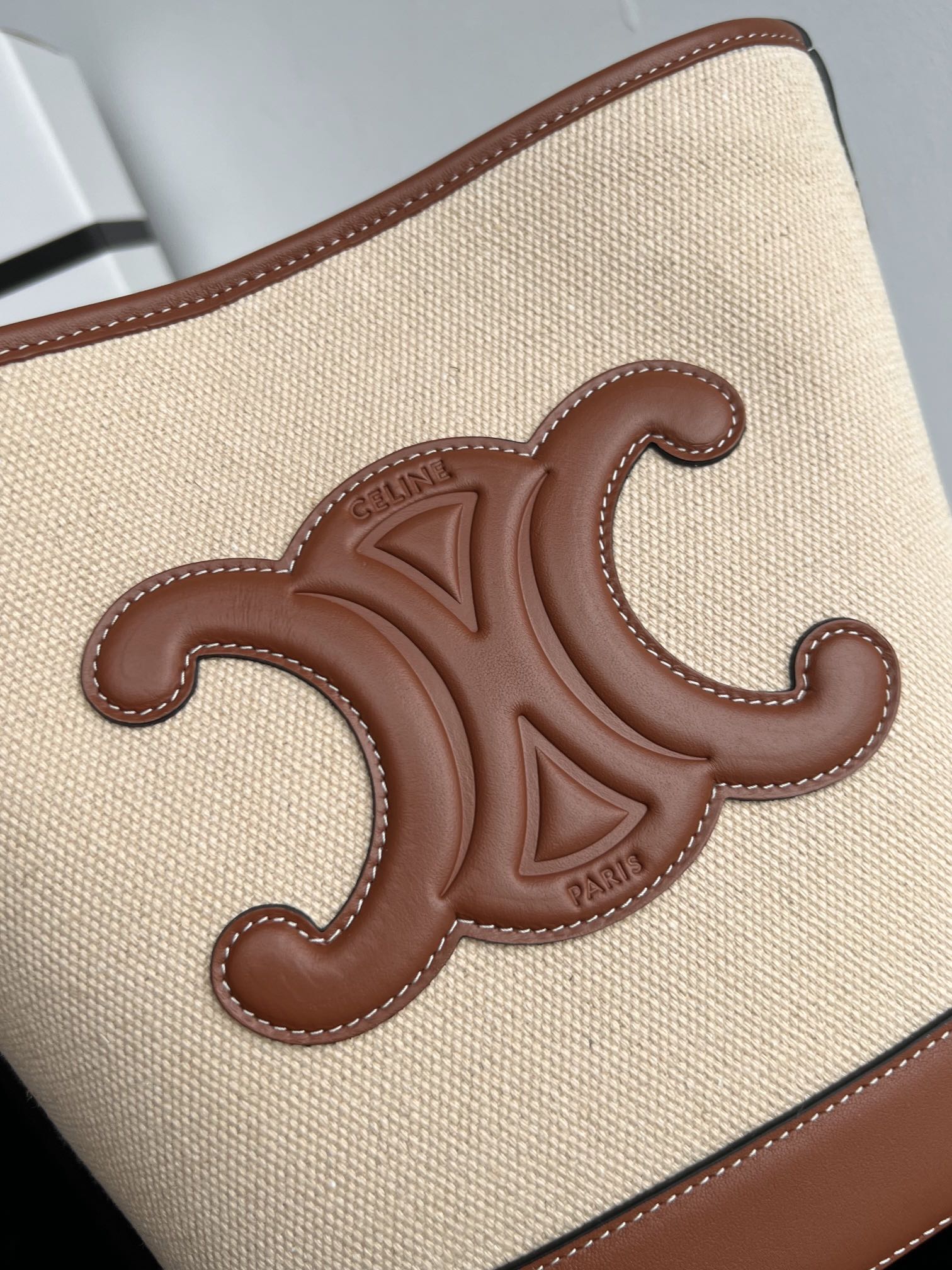 PETIT SEAU CUIR TRIOMPHE 24CM EN TEXTILE RAYÉ ET CUIR DE VEAU BRUN
