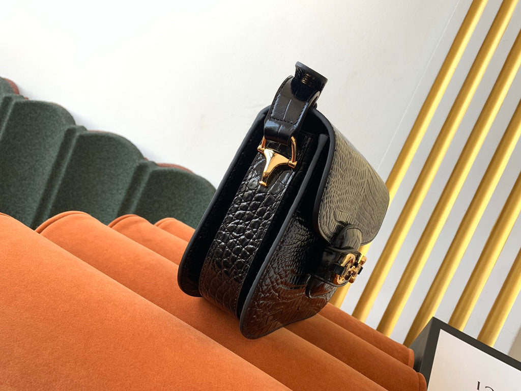 SAC À MORS GG 1955 25 CM EN CUIR DE CROCODILE NOIR ET QUINCAILLERIE DORÉ