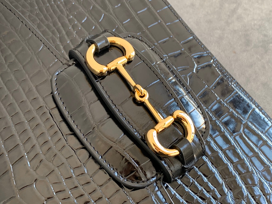 SAC À MORS GG 1955 25 CM EN CUIR DE CROCODILE NOIR ET QUINCAILLERIE DORÉ