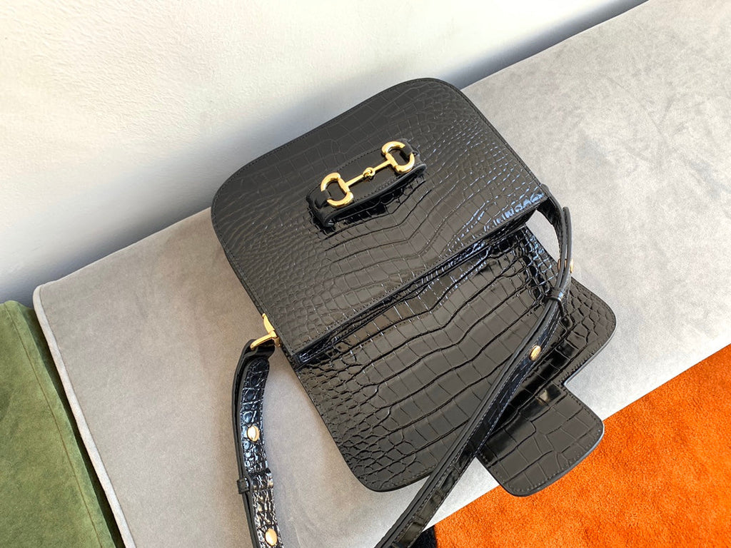 SAC À MORS GG 1955 25 CM EN CUIR DE CROCODILE NOIR ET QUINCAILLERIE DORÉ