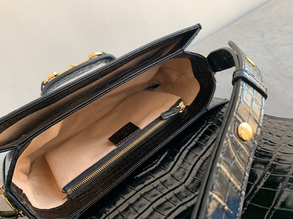 SAC À MORS GG 1955 25 CM EN CUIR DE CROCODILE NOIR ET QUINCAILLERIE DORÉ