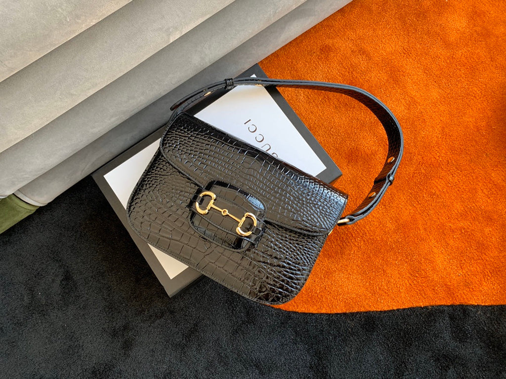 SAC À MORS GG 1955 25 CM EN CUIR DE CROCODILE NOIR ET QUINCAILLERIE DORÉ
